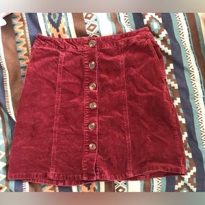 Burgundy corduroy mini skirt. Size 2